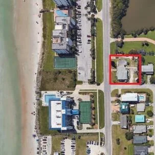 Aerial view of Aloha Apartments near the beach in New Smyrna Beach, Florida